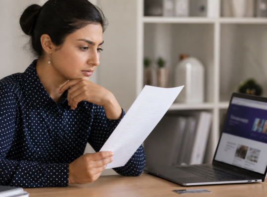 Entrepreneur reading the terms of a training guarantee before purchasing