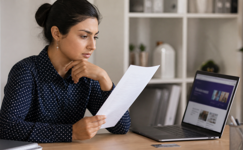 Entrepreneur reading the terms of a training guarantee before purchasing
